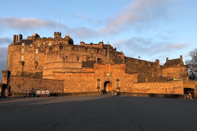 Essential Walking Tour of Edinburgh's Old Town - Grassmarket views beneath Edinburgh Castle