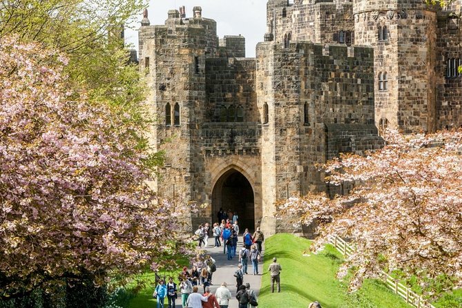 Harry Potter's Alnwick Castle and Scottish Borders Day Trip - Crossing into Northumberland for Bamburgh Castle