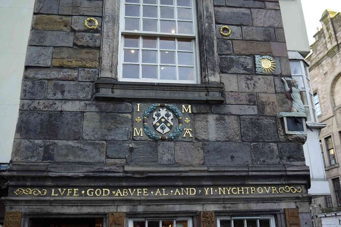 Highlights from the Royal Mile: A Self-Guided Audio Tour - Mercat Cross and the stories beneath the marketplace