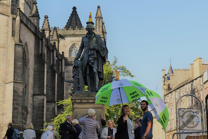 Old Town Walking Tour History and Tales in Edinburgh - Mercat Cross, George Heriot School, and stories in stone